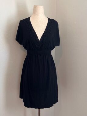 NWT The House of Woo Black lace trim dress with V-neckline. Size: M